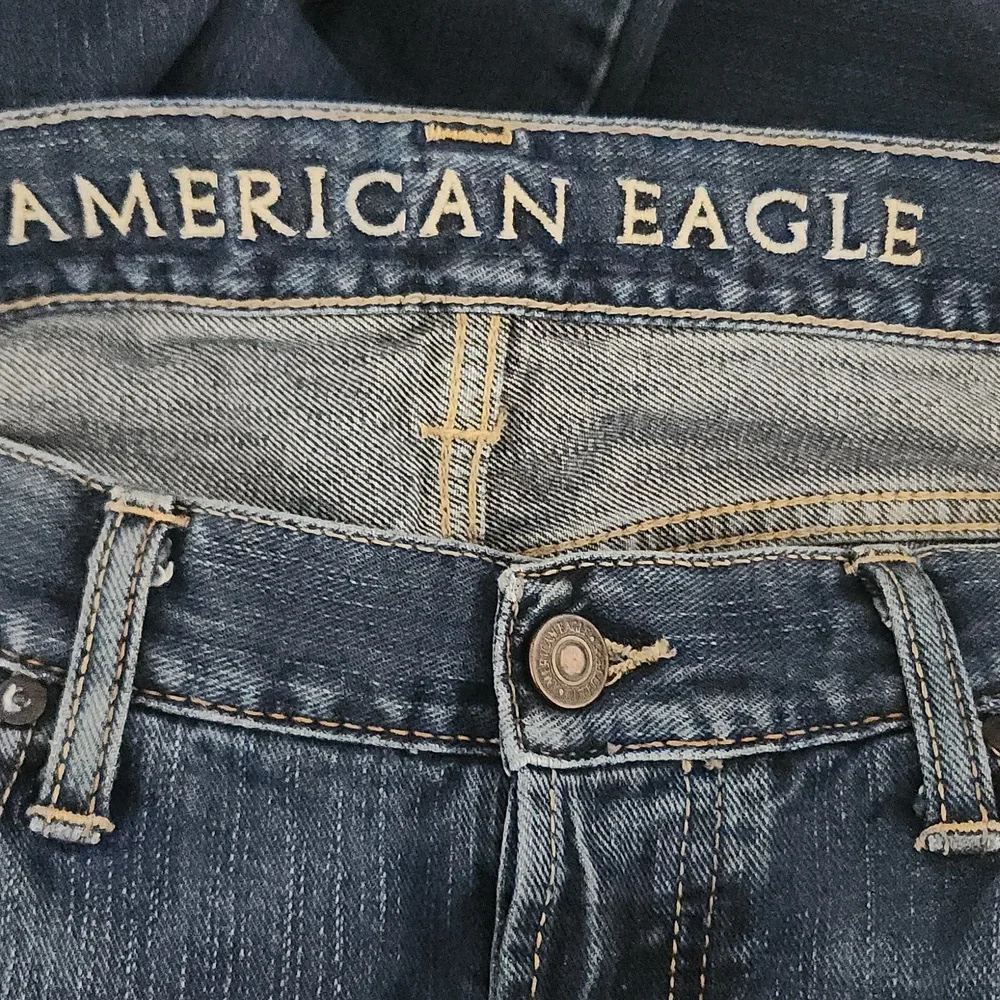 American Eagle Outfitters Men's Button Fly Low Rise Bootcut Distressed Jeans
